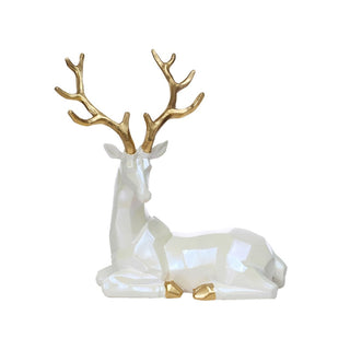 Figura de reno blanco recostado de 24 × 13 × 27 cm