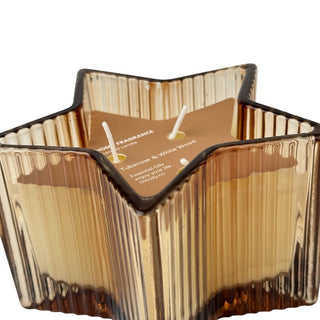 Vela aromática tuberosa y madera blanca envase de vidrio en forma de estrella 13 cm