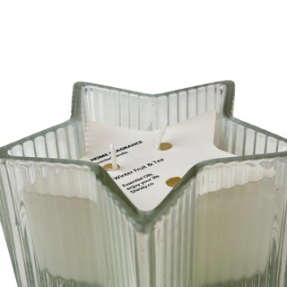 Vela aromática fruta de invierno y te en envase de vidrio en forma de estrella 13 cm