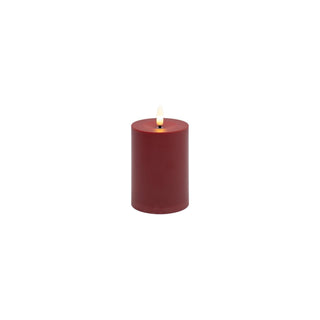 Vela pilar decorativa LED a batería 7 × 10 cm - color rojo